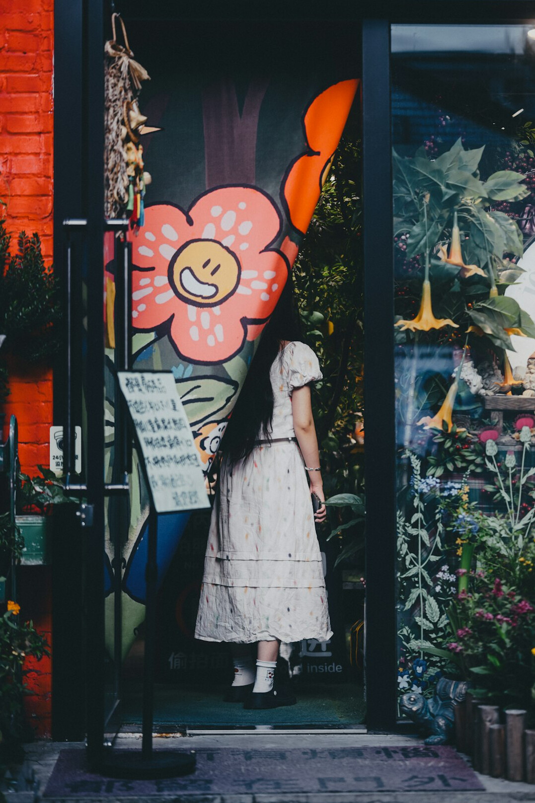 woman standing in doorway